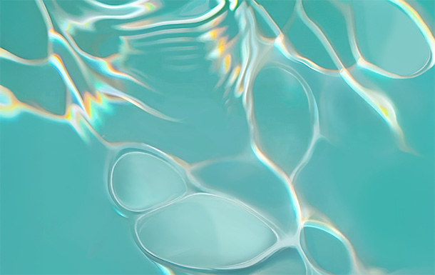 This image shows a close-up view of water with light reflections and refractions creating abstract patterns on the surface. The water appears to be clear and the light creates a shimmering effect with various shades of blue and hints of rainbow colors. How can I assist you with this image?